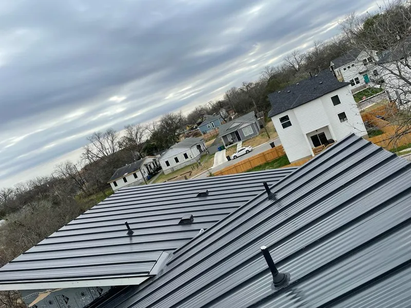 Standing seam metal roof panels with vents for Skylight Repair in Weirton